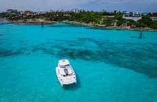 Private Boat Trip to Isla Mujeres + Open Bar